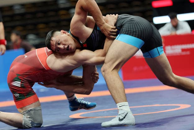 (260809) -- XI AN, Aug. 9, 2026 -- Magomet Evloev (L) of Tajikistan and Gang Suhe of China compete during the men s freestyle 86kg final at 2026 China-Central Asia Elite Wrestling Tournament in Xi an, northwest China s Shaanxi Province, Aug. 9, 2026. ) (SP)CHINA-XI AN-WRESTLING-2026 CHINA-CENTRAL ASIA ELITE WRESTLING TOURNAMENT (CN) LixYibo 