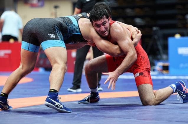 (260809) -- XI AN, Aug. 9, 2026 -- Sherzod Poyonov (R) of Uzbekistan and Habila Awusayiman of China compete during the men s freestyle 97kg final at 2026 China-Central Asia Elite Wrestling Tournament in Xi an, northwest China s Shaanxi Province, Aug. 9, 2026. ) (SP)CHINA-XI AN-WRESTLING-2026 CHINA-CENTRAL ASIA ELITE WRESTLING TOURNAMENT (CN) LixYibo 