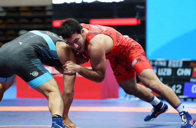 (260809) -- XI AN, Aug. 9, 2026 -- Sherzod Poyonov (R) of Uzbekistan and Habila Awusayiman of China compete during the men s freestyle 97kg final at 2026 China-Central Asia Elite Wrestling Tournament in Xi an, northwest China s Shaanxi Province, Aug. 9, 2026. ) (SP)CHINA-XI AN-WRESTLING-2026 CHINA-CENTRAL ASIA ELITE WRESTLING TOURNAMENT (CN) LixYibo 