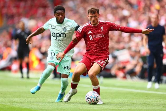 Stanis Idumbo of Monaco and Calvin Ramsay of Liverpool Liverpool v Monaco, Pre Season Friendly, Football, Anfield, Liverpool, UK - 09 Aug 2026Liverpool Anfield United Kingdom EDITORIAL USE ONLY No use with unauthorised audio, video, data, fixture lists, club league logos or live services. Online in-match use limited to 120 images, no video emulation. No use in betting, games or single club league player publications.  Copyright: xPaulxCurrie Shutterstockx 17051142fa