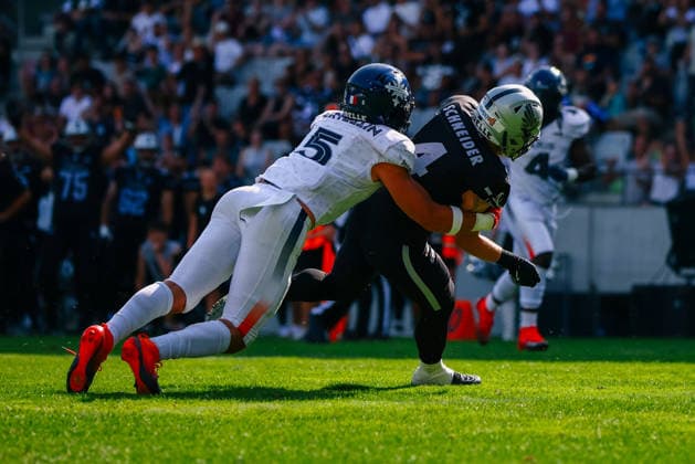 AMERICAN FOOTBALL - EFA, Raiders vs Musketeers INNSBRUCK,AUSTRIA,09.AUG.26 - AMERICAN FOOTBALL - EFA, Raiders Tirol vs Paris Musketeers. Image shows Remi Bertellin (Paris Musketeers) and Jakob Timmermann (Raiders).  GEPAxpictures xOleskiixMarusyk