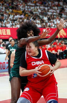 (260809) -- HAIKOU, Aug. 9, 2026 -- Liu Yutong (R) of China competes during a friendly basketball match between China and Nigeria in Haikou, south China s Hainan Province, Aug. 9, 2026. ) (SP)CHINA-HAIKOU-BASKETBALL-FRIENDLY-CHINA VS NIGERIA (CN) YangxGuanyu 