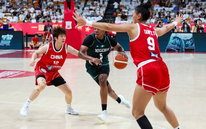 (260809) -- HAIKOU, Aug. 9, 2026 -- Jordan Obi (C) of Nigeria breaks through during a friendly basketball match between China and Nigeria in Haikou, south China s Hainan Province, Aug. 9, 2026. ) (SP)CHINA-HAIKOU-BASKETBALL-FRIENDLY-CHINA VS NIGERIA (CN) YangxGuanyu 