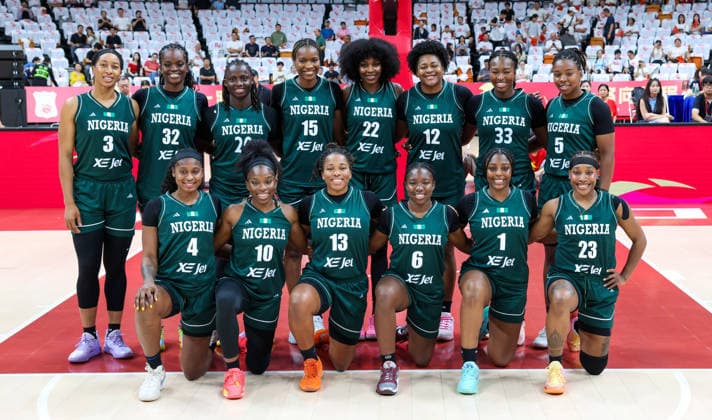 (260809) -- HAIKOU, Aug. 9, 2026 -- Players of Nigeria pose for a group photo before a friendly basketball match between China and Nigeria in Haikou, south China s Hainan Province, Aug. 9, 2026. ) (SP)CHINA-HAIKOU-BASKETBALL-FRIENDLY-CHINA VS NIGERIA (CN) YangxGuanyu 