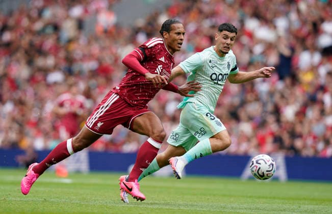 Liverpool, England, 9th August 2026. Virgil van Dijk of Liverpool (L) challenges Matthis Abline of Monaco during the Liverpool vs AS Monaco Pre Season Friendly match at Anfield, Liverpool. Picture credit should read: Andrew Yates Sportimage EDITORIAL USE ONLY. No use with unauthorised audio, video, data, fixture lists, club league logos or live services. Online in-match use limited to 120 images, no video emulation. No use in betting, games or single club league player publications. SPI_018_AY_LIVERPOOL_MONACO SPI-4893-0020