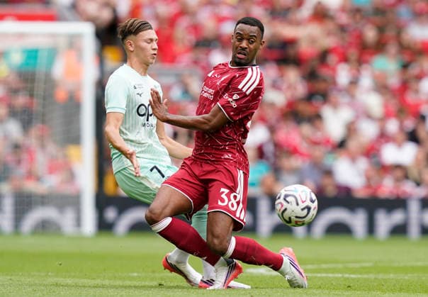 Liverpool, England, 9th August 2026. Ryan Gravenberch of Liverpool (R) challenges Mathys Detourbet of Monaco during the Liverpool vs AS Monaco Pre Season Friendly match at Anfield, Liverpool. Picture credit should read: Andrew Yates Sportimage EDITORIAL USE ONLY. No use with unauthorised audio, video, data, fixture lists, club league logos or live services. Online in-match use limited to 120 images, no video emulation. No use in betting, games or single club league player publications. SPI_012_AY_LIVERPOOL_MONACO SPI-4893-0021