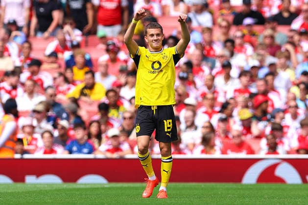 Konstantinos Karetsas of Borussia Dortmund celebrates his goal and his sides second goal during the pre-season friendly match between Arsenal FC and Borussia Dortmund at Emirates Stadium on August 9, 2026 in London, England. (Photo by Ryan Crockett DeFodi Images) - *** Konstantinos Karetsas of Borussia Dortmund celebrates his goal—his team s second—during the preseason friendly match between Arsenal FC and Borussia Dortmund at Emirates Stadium on August 9, 2026, in London, England. Photo by Ryan Crockett, DeFodi Images