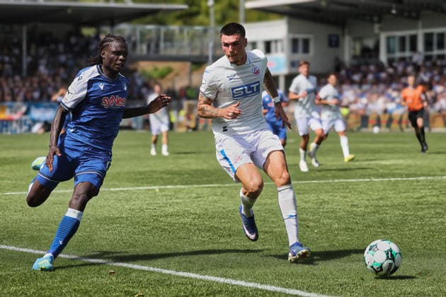 v.li.Blessing Makanda (TSG Hoffenheim II, 17),Niklas Koelle (FC Hansa Rostock, 32) GER, TSG Hoffenheim II - Hansa Rostock Fussball 1.Spieltag Spielzeit 2026 2027 3.Liga 09.08.2026 (DFL DFB REGULATIONS PROHIBIT ANY USE OF PHOTOGRAPHS as IMAGE SEQUENCES and or QUASI-VIDEO). GER TSG Hoffenheim II - Hansa Rostock Fussball 1.Spieltag Spielzeit 2026 2027 09.08.2026 Hoffenheim *** From left: Blessing Makanda (TSG Hoffenheim II), 17; Niklas Koelle (FC Hansa Rostock), 32 (GER), TSG Hoffenheim II vs. Hansa Rostock Soccer Matchday 1, 2026–2027 Season, 3rd Division, September 8, 2026. DFL and DFB regulations prohibit any use of photographs as image sequences and or quasi-VVIDEO GER TSG Hoffenheim II Hansa Rostock Soccer Matchday 1 Season 2026–2027 August 9, 2026 Hoffenheim Copyright: xEibner-Pressefoto JoergxHirschx EP_JHH