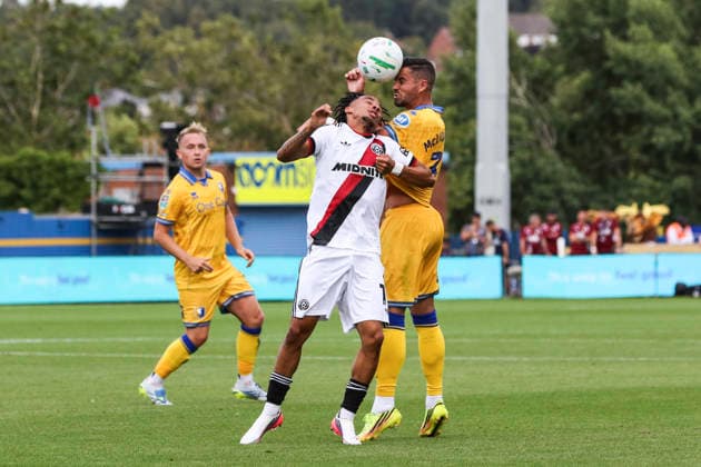 Mansfield Town v Sheffield United, Carabao Cup Stephen McLaughlin of Mansfield Town and Romelle Donovan of Sheffield United battle for the ball during the Mansfield Town v Sheffield United Carabao Cup 1st Round match at Field Mill One Call Stadium, Mansfield, England on 9 August 2026 Credit: Richard Bierton Every Second Media Editorial use only. All images are copyright Every Second Media Limited. No images may be reproduced without prior permission. All rights reserved. Premier League and Football League images are subject to licensing agreements with Football DataCo Limited. see https: www.football-dataco.com Copyright: xIMAGO EveryxSecondxMediax ESM-2086-0045 RichardxBiertonx xEveryxSecondxMediax