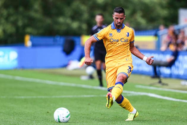 Mansfield Town v Sheffield United, Carabao Cup Stephen McLaughlin of Mansfield Town passes the ball during the Mansfield Town v Sheffield United Carabao Cup 1st Round match at Field Mill One Call Stadium, Mansfield, England on 9 August 2026 Credit: Richard Bierton Every Second Media Editorial use only. All images are copyright Every Second Media Limited. No images may be reproduced without prior permission. All rights reserved. Premier League and Football League images are subject to licensing agreements with Football DataCo Limited. see https: www.football-dataco.com Copyright: xIMAGO EveryxSecondxMediax ESM-2086-0048 RichardxBiertonx xEveryxSecondxMediax