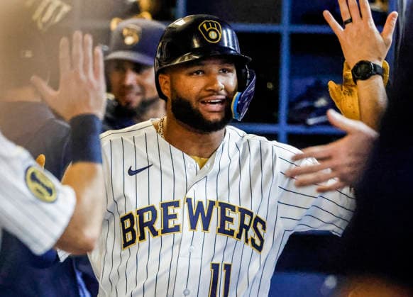 Milwaukee Brewers left fielder Jackson Chourio celebrates in the dugout after hitting a home run in the first inning of the MLB, Baseball Herren, USA game between the Minnesota Twins and the Milwaukee Brewers at American Family Field in Milwaukee, Wisconsin on Sunday, August 9, 2026.  MIL20260809807 TANNENxMAURY
