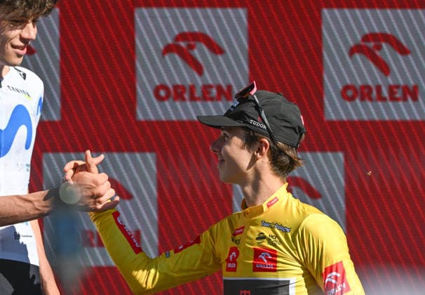 83rd Tour De Pologne 2026 - Stage 7 WIELICZKA, POLAND - AUGUST 09: Overall race winner Marco Brenner (C) of Germany and Tudor Pro Cycling Team, wearing the ORLEN Yellow Jersey, celebrates alongside third-place finisher Ivan Romeo (L) of Spain and Movistar Team during the final podium ceremony of the 83rd Tour de Pologne 2026, Stage 7 a 12.5km individual time trial stage from Wieliczka to Wieliczka UCIWT on August 09, 2026 in Wieliczka, Poland. Wieliczka Poland  Copyright: xArturxWidakx originalFilename:widak-83rdtour260809_npHXX.jpg