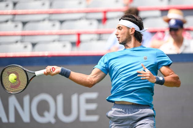 MONTREAL, QC - AUGUST 09: Thiago Augustin Tirante (ARG) returns the ball during a fourth round match at National Bank Open on August 09, 2026 at IGA Stadium in Montreal, QC (Photo by David Kirouac Icon Sportswire) TENNIS: AUG 09 National Bank Open EDITORIAL USE ONLY Icon26080901626