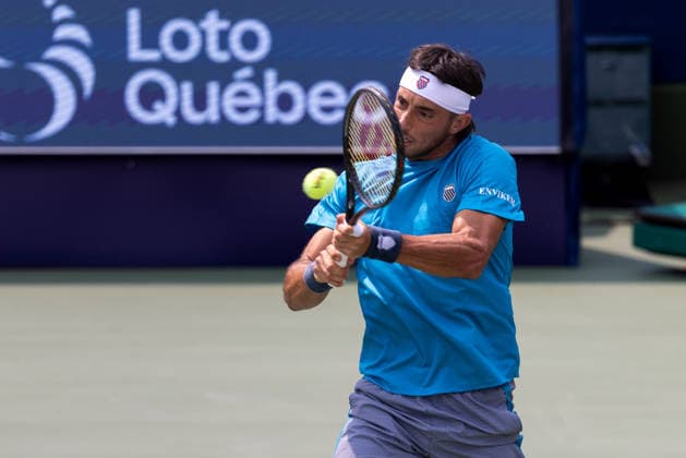 August 9, 2026, Montreal, Quebec, Canada: THIAGO AUGUSTIN TIRANTE from Argentina backhand in match against Learner Tien (12) from USA in round of 16 at Canadian Open at IGA stadium in Montreal, Quebec, Canada on 2026-08-09 TENNIS: Canadian Open Montreal 2026  - ZUMAl189 20260809_zsp_l189_054 Copyright: xYannickxLegarex