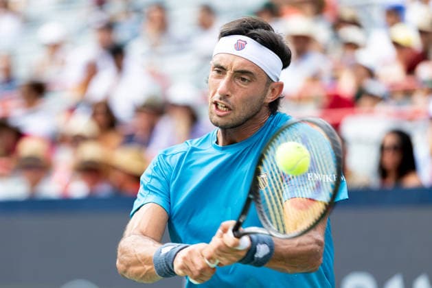 August 9, 2026, Montreal, Quebec, Canada: THIAGO AUGUSTIN TIRANTE from Argentina backhand in match against Learner Tien (12) from USA in round of 16 at Canadian Open at IGA stadium in Montreal, Quebec, Canada on 2026-08-09 TENNIS: Canadian Open Montreal 2026  - ZUMAl189 20260809_zsp_l189_058 Copyright: xYannickxLegarex