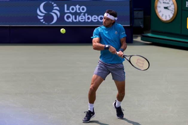 August 9, 2026, Montreal, Quebec, Canada: THIAGO AUGUSTIN TIRANTE from Argentina backhand in match against Learner Tien (12) from USA in round of 16 at Canadian Open at IGA stadium in Montreal, Quebec, Canada on 2026-08-09 TENNIS: Canadian Open Montreal 2026  - ZUMAl189 20260809_zsp_l189_074 Copyright: xYannickxLegarex