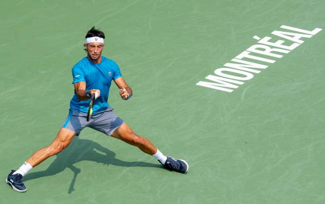 August 9, 2026, Montreal, Pq, Canada: Thiago Agustin Tirante of Argentina hits a return to Learner Tien of the United States during Round of 16 tennis action at the National Bank Open in Montreal on Sunday, Aug. 9, 2026. Canada News - August 9, 2026  - ZUMAc35_ 20260809_zaf_c35_033 Copyright: xChristinnexMuschix
