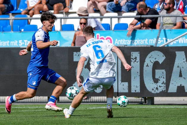 v.li.: Florian Micheler (TSG II, 28), Jonas Dirkner (Rostock, 6), Zweikampf, Spielszene, Duell, duel, tackle, tackling, Dynamik, Action, Aktion, 09.08.2026, Sinsheim (Deutschland), Fussball, 3. Liga, TSG 1899 Hoffenheim II - Hansa Rostock, DFB DFL REGULATIONS PROHIBIT ANY USE OF PHOTOGRAPHS AS IMAGE SEQUENCES AND OR QUASI-VIDEO. *** From left: Florian Micheler (TSG II), 28; Jonas Dirkner (Rostock), 6; tackle, game scene, duel, tackle, tackling, dynamism, action, 09 08 2026, Sinsheim, Germany, soccer, 3rd Division, TSG 1899 Hoffenheim II vs. Hansa Rostock, DFB and DFL regulations prohibit any use of photographs as image sequences and or quasi-video xozx