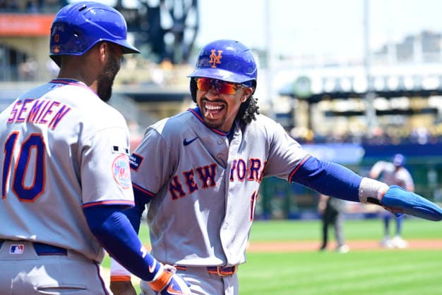 New York Mets shortstop Francisco Lindor (12) celebrates scoring in the first inning against the Pittsburgh Pirates at PNC Park on Sunday, August 9, 2026 in Pittsburgh.  PIT2026080906 ArchiexCarpenter