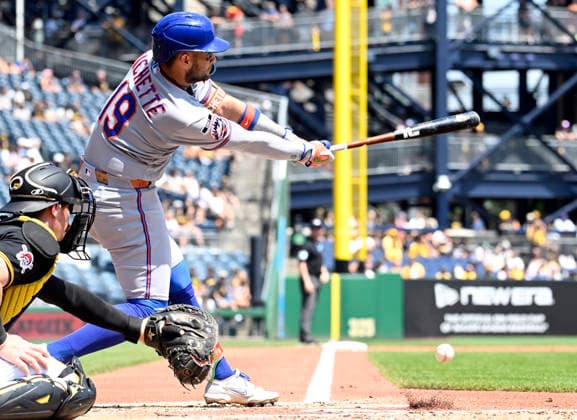 New York Mets third baseman Bo Bichette (19) hits an infield single and goes on to score later in the third inning against the Pittsburgh Pirates at PNC Park on Sunday, August 9, 2026 in Pittsburgh.  PIT2026080909 ArchiexCarpenter