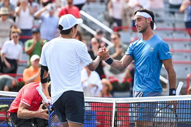 MONTREAL, QC - AUGUST 09: Thiago Augustin Tirante (ARG) congratulates Learner Tien (USA) for his win of a fourth round match at National Bank Open on August 09, 2026 at IGA Stadium in Montreal, QC (Photo by David Kirouac Icon Sportswire) TENNIS: AUG 09 National Bank Open EDITORIAL USE ONLY Icon26080905726
