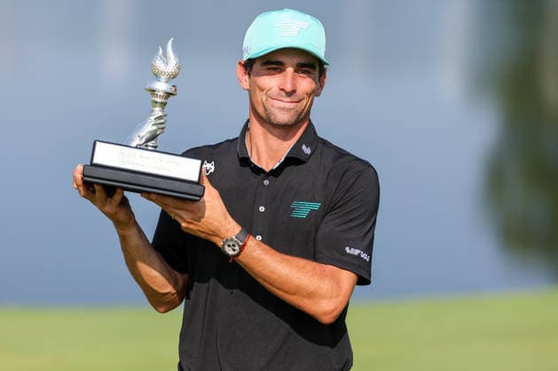 BEDMINSTER, NJ - AUGUST 09: Joaquin Niemann of the LIV Golf League celebrates with the trophy after winning LIV Golf New York on August 9, 2026 at Trump National Golf Club in Bedminster, New Jersey. (Photo by Andrew Mordzynski Icon Sportswire) GOLF: AUG 09 LIV Golf New York EDITORIAL USE ONLY Icon2608098173345