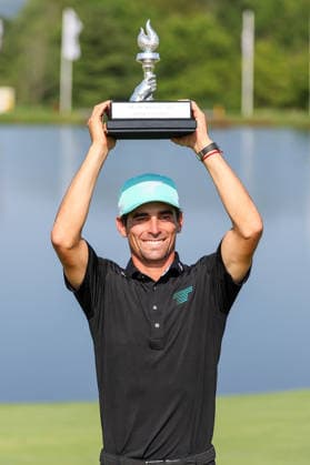 BEDMINSTER, NJ - AUGUST 09: Joaquin Niemann of the LIV Golf League celebrates with the trophy after winning LIV Golf New York on August 9, 2026 at Trump National Golf Club in Bedminster, New Jersey. (Photo by Andrew Mordzynski Icon Sportswire) GOLF: AUG 09 LIV Golf New York EDITORIAL USE ONLY Icon2608098173349