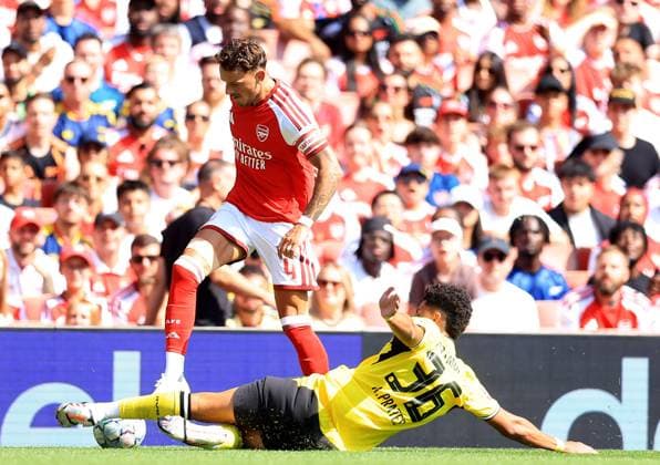 Ben White of Arsenal in action against Kaua Prates of Borussia Dortmund Arsenal v Borussia Dortmund, Pre Season Friendly, Football, Emirates Stadium, London, UK - 09 Aug 2026London Emirates Stadium United Kingdom EDITORIAL USE ONLY No use with unauthorised audio, video, data, fixture lists, club league logos or live services. Online in-match use limited to 120 images, no video emulation. No use in betting, games or single club league player publications.  Copyright: xGeorgexTewkesbury Shutterstockx 17051143dr