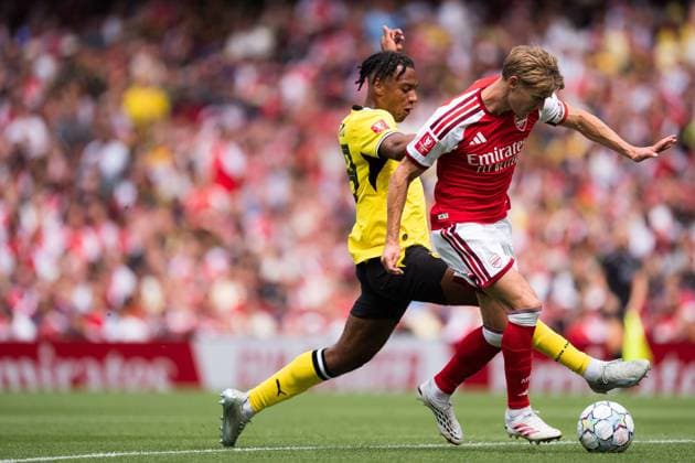 Martin Odegaard of Arsenal is tackled by Filippo Mane of Borussia Dortmund Arsenal vs Borussia Dortmund, Emirates Cup, Final, Emirates Stadium, London, UK - 09 Aug 2026London Emirates Stadium United Kingdom  Copyright: xWiredxPhotos Shutterstockx 17058922cu