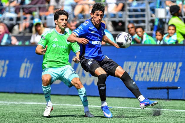 July 25, 2026: Seattle Sounders FC Forward Paul Rothrock (14) and Queretaro Midfielder Waldo Emilio Madrid Quezada (29) battle for the ball during the Leagues Cup match between Seattle Sounders FC and Quero taro in Seattle, WA. the Sounders defeated Quero taro 3-0. CSM Seattle United States - ZUMAc04_ 20260809_zma_c04_048 Copyright: xStevexFaberx