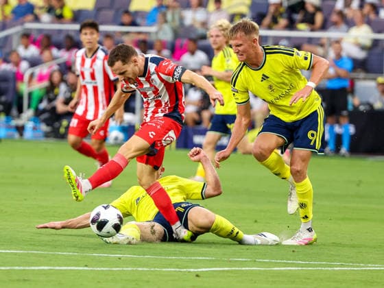 August 9, 2026: Nashville SC midfielder Alex Muyl (19) is tripped up with Nashville SC forward Sam Surridge (9) tracking down the ball during a Leagues Cup match between Atletico de San Luis and Nashville SC at Geodis Park in Nashville, TN. CSM Nashville United States of America - ZUMAc04_ 20260809_zma_c04_081 Copyright: xStephenxFurstx