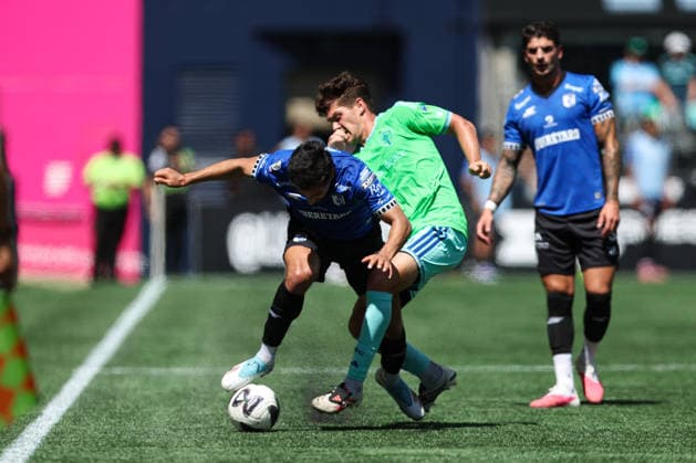 SEATTLE, WA - AUGUST 09: Forward Eduardo PÃ rez 26 of QuerÃ taro and defender Kalani Kossa-Rienzi 85 of the Seattle Sounders battle for possession during a Leagues Cup match between Queretaro and the Seattle Sounders on August 9, 2026 at Lumen Field in Seattle, Washington. (Photo by Henry Rodenburg Icon Sportswire) SOCCER: AUG 09 Leagues Cup Seattle vs Queretaro EDITORIAL USE ONLY Icon26080928