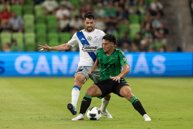AUSTIN, TX - AUGUST 09: Midfielder Owen Wolff 33 of the Austin FC blocks out midfielder Sergio Sanabria 21 of Club Puebla from the ball during the Leagues Cup match between Austin FC and Club Puebla on August 9, 2026, at Q2 Stadium in Austin, TX. (Photo by David Buono Icon Sportswire) SOCCER: AUG 09 Leagues Cup Austin vs Puebla EDITORIAL USE ONLY Icon260809017