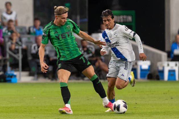 AUSTIN, TX - AUGUST 09: Forward Przemyslaw Placheta 77 of the Austin FC takes a pass as he is pursued by forward Fernando Monarrez 7 of Club Puebla during the Leagues Cup match between Austin FC and Club Puebla on August 9, 2026, at Q2 Stadium in Austin, TX. (Photo by David Buono Icon Sportswire) SOCCER: AUG 09 Leagues Cup Austin vs Puebla EDITORIAL USE ONLY Icon260809031