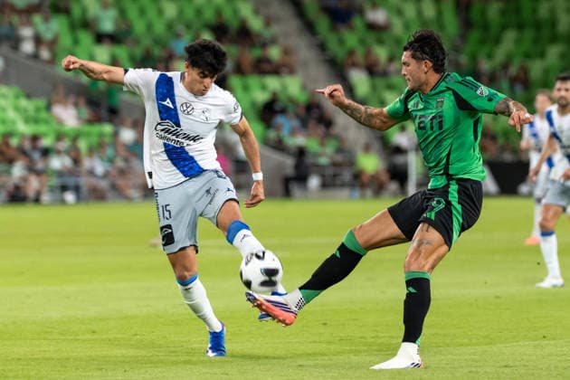 AUSTIN, TX - AUGUST 09: Forward Brandon Vazquez 9 of the Austin FC and defender Oscar Villa 15 of Club Puebla kick for a loose ball during the Leagues Cup match between Austin FC and Club Puebla on August 9, 2026, at Q2 Stadium in Austin, TX. (Photo by David Buono Icon Sportswire) SOCCER: AUG 09 Leagues Cup Austin vs Puebla EDITORIAL USE ONLY Icon260809040