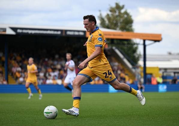 Regan Hendry of Mansfield Town Mansfield Town v Sheffield United, EFL Carabao Cup, First Round, Football, One Call Stadium, Mansfield, UK - 09 Aug 2026Mansfield One Call Stadium United Kingdom EDITORIAL USE ONLY No use with unauthorised audio, video, data, fixture lists, club league logos or live services. Online in-match use limited to 120 images, no video emulation. No use in betting, games or single club league player publications.  Copyright: xAnnaxGowthorpe Shutterstockx 17051191cw