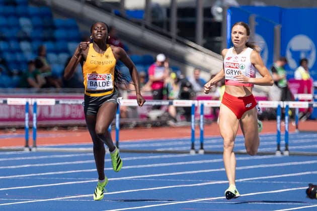 BIRMINGHAM, GREAT BRITAIN - AUGUST 10, 2026 : Vanessa BALDÉ (GER Germany) and Anna GRYC (POL Poland) competing in the 400m hurdles heats during the European Athletics Championships at Alexander Stadium on August 10, 2026 in Birmingham, Great Britain. Nordrhein-Westfalen Great Britain Copyright: xLeahxKohringx