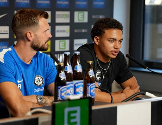 SOCCER - UEFA CL, Sturm vs Fenerbahce GRAZ,AUSTRIA,10.AUG.26 - SOCCER - UEFA Champions League, qualification, Sturm Graz vs Fenerbahce Istanbul, preview, press conference, PK, Pressekonferenz Sturm. Image shows head coach Fabio Ingolitsch and Jakob Peter Hoedl (Sturm).  GEPAxpictures xMichaelxRiedler