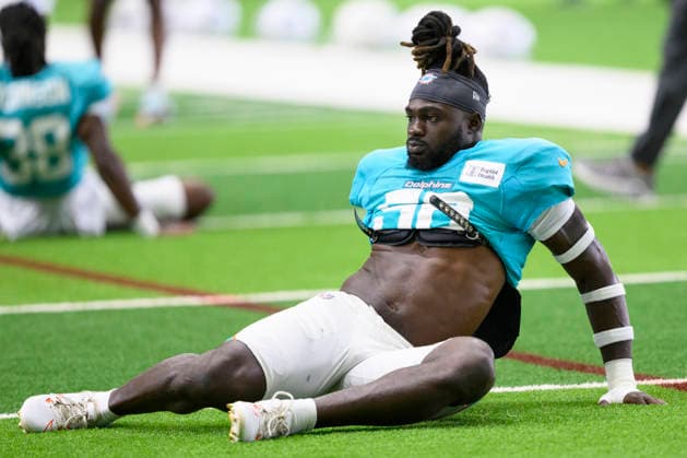 MIAMI GARDENS, FL - AUGUST 10: Miami Dolphins linebacker Ronnie Harrison Jr. (56) stretches during the Miami Dolphins Training Camp on August 10 2026, at the Baptist Health Training Complex in Miami Gardens, FL. (Photo by Doug Murray Icon Sportswire) NFL, American Football Herren, USA AUG 10 Dolphins Training Camp EDITORIAL USE ONLY Icon796260810113