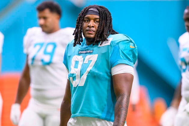 MIAMI GARDENS, FL - AUGUST 10: Miami Dolphins defensive lineman Keith Cooper Jr. (97) stands during the Miami Dolphins Training Camp on August 10 2026, at the Baptist Health Training Complex in Miami Gardens, FL. (Photo by Doug Murray Icon Sportswire) NFL, American Football Herren, USA AUG 10 Dolphins Training Camp EDITORIAL USE ONLY Icon796260810125