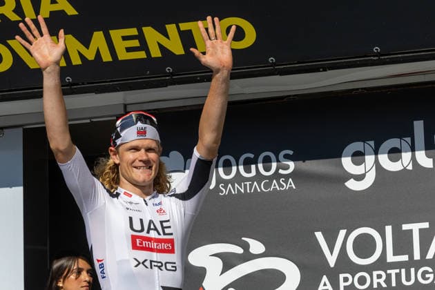 5th Stage Podium At The 87th Volta A Portugal Danish cyclist Julius Johansen of UAE Team Emirates-XRG celebrates on the podium after winning the fifth stage of the 87th Volta a Portugal, an individual time trial from Anadia to Agueda, Portugal, on August 10, 2026. Agueda Portugal  Copyright: xEduardoxAlmeidax originalFilename:almeida-juliusjo260810_np3fZ.jpg