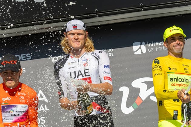 5th Stage Podium At The 87th Volta A Portugal Danish cyclist Julius Johansen of UAE Team Emirates-XRG celebrates on the podium after winning the fifth stage of the 87th Volta a Portugal, an individual time trial from Anadia to Agueda, Portugal, on August 10, 2026. Agueda Portugal  Copyright: xEduardoxAlmeidax originalFilename:almeida-juliusjo260810_npA46.jpg