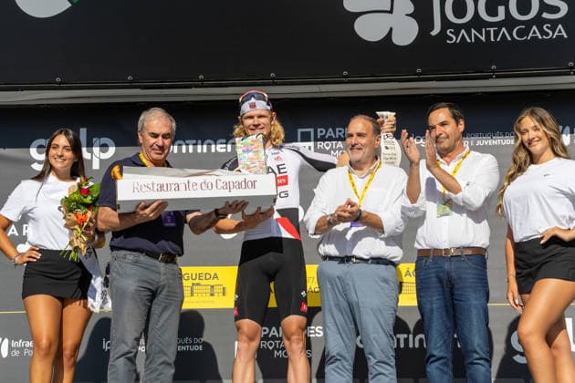 5th Stage Podium At The 87th Volta A Portugal Danish cyclist Julius Johansen of UAE Team Emirates-XRG celebrates on the podium after winning the fifth stage of the 87th Volta a Portugal, an individual time trial from Anadia to Agueda, Portugal, on August 10, 2026. Agueda Portugal  Copyright: xEduardoxAlmeidax originalFilename:almeida-juliusjo260810_npPIu.jpg