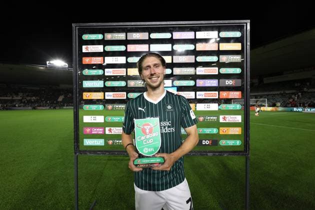 Alex Hartridge of Plymouth Argyle with the Carabao player of the match award at full time Plymouth Argyle v Exeter City, EFL Carabao Cup, First Round, Football, Home Park, Plymouth, UK - 10 Aug 2026Plymouth Home Park United Kingdom EDITORIAL USE ONLY No use with unauthorised audio, video, data, fixture lists, club league logos or live services. Online in-match use limited to 120 images, no video emulation. No use in betting, games or single club league player publications.  Copyright: xKieranxMcManus Shutterstockx 17061087bo