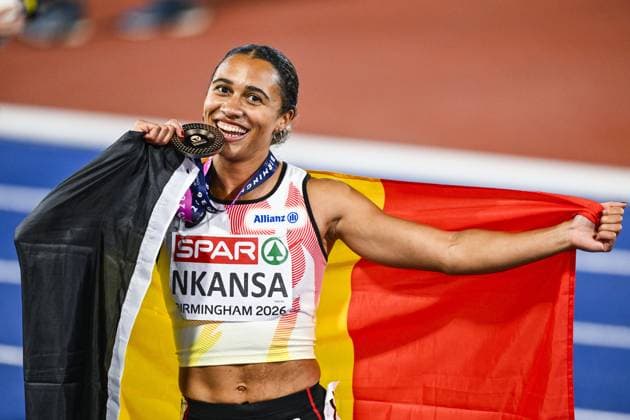 Belgian Delphine Nkansa celebrates with her bronze medal and the Belgian flag after the final of the women s 100m race at the European Athletics Championships (August 10-18) in Birmingham, United Kingdom, on Monday 10 August 2026. ERICxLALMAND  x183110050x