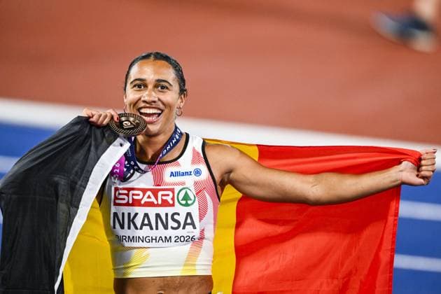 Belgian Delphine Nkansa celebrates with her bronze medal and the Belgian flag after the final of the women s 100m race at the European Athletics Championships (August 10-18) in Birmingham, United Kingdom, on Monday 10 August 2026. ERICxLALMAND  x183110096x