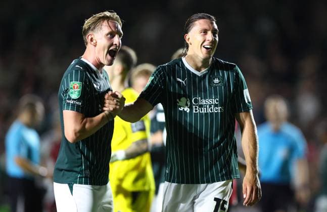 Ronan Curtis and Alex Mitchell of Plymouth Argyle celebrate at full time Plymouth Argyle v Exeter City, EFL Carabao Cup, First Round, Football, Home Park, Plymouth, UK - 10 Aug 2026Plymouth Home Park United Kingdom EDITORIAL USE ONLY No use with unauthorised audio, video, data, fixture lists, club league logos or live services. Online in-match use limited to 120 images, no video emulation. No use in betting, games or single club league player publications.  Copyright: xKieranxMcManus Shutterstockx 17061087bw