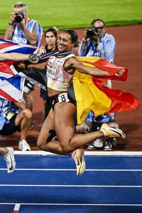 Belgian Delphine Nkansa celebrates with her bronze medal and the Belgian flag after the final of the women s 100m race at the European Athletics Championships (August 10-18) in Birmingham, United Kingdom, on Monday 10 August 2026. ERICxLALMAND  x183110253x