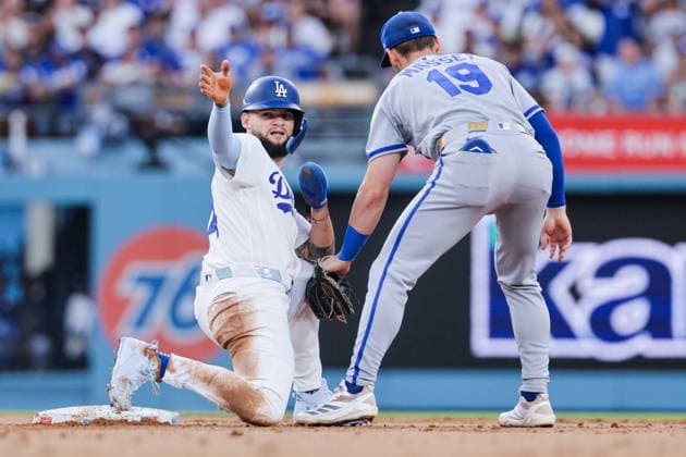 MLB, Baseball Herren, USA - Los Angeles Dodgers vs Kansas City Royals Dodgers center fielder Andy Pages (L) reaches second base before being tagged by Royals second baseman Michael Massey in the first inning of an MLB game between the Los Angeles Dodgers and Kansas City Royals at Uniqlo Field in Dodger Stadium in Los Angeles, California, USA, 10 August 2026. LOS ANGELES CALIFORNIA United States  Copyright: xCHRISxTORRESx