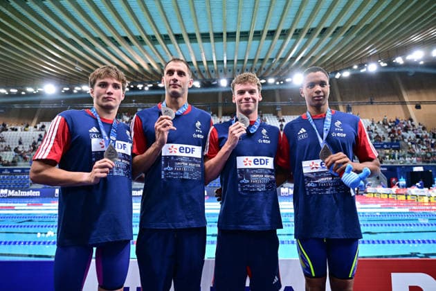 European Aquatics Championship 2026 - Leon Marchand and His Family Team France Pierre Largeron, Roman Fuchs, Leon Marchand and saver Cristofini win silver medal after the men’s 4X200 freestyle final at the European Aquatics Championships 2026 in Saint-Denis on August 10, 2026. Photo by Tomas Stevens ABACAPRESS.COM Saint-Denis Ile-de-France France  Copyright: xStevensxTomas ABACAx